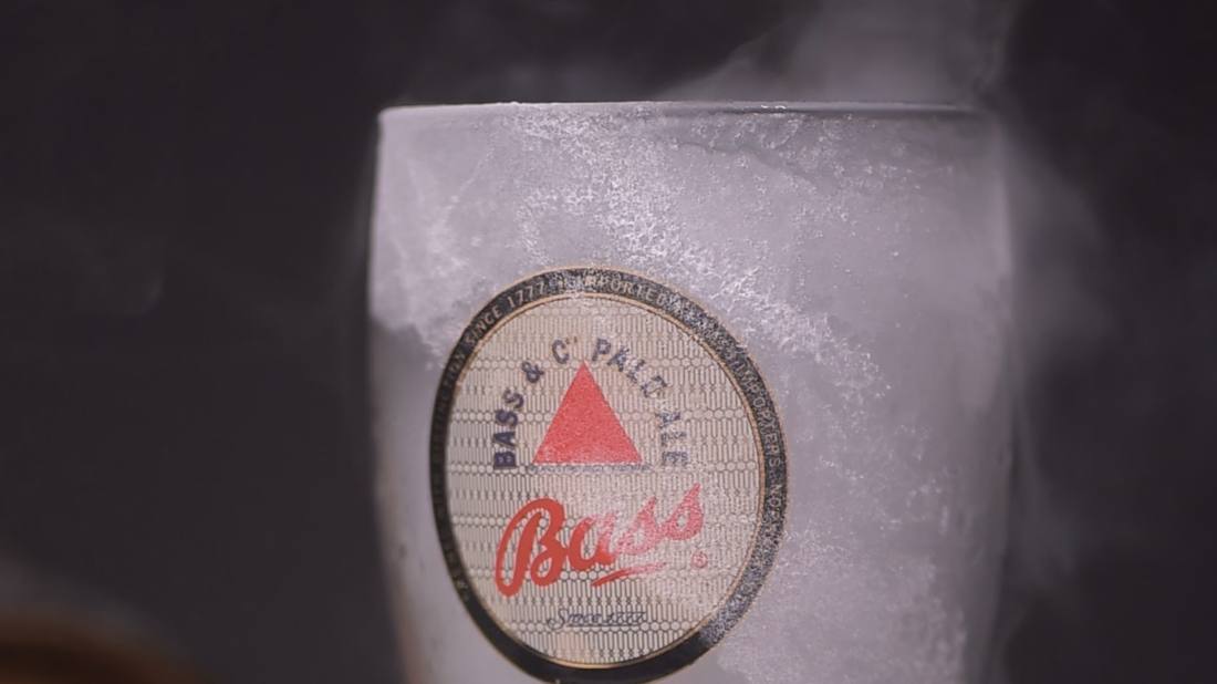 A frosted pint glass shot for a beverage brand