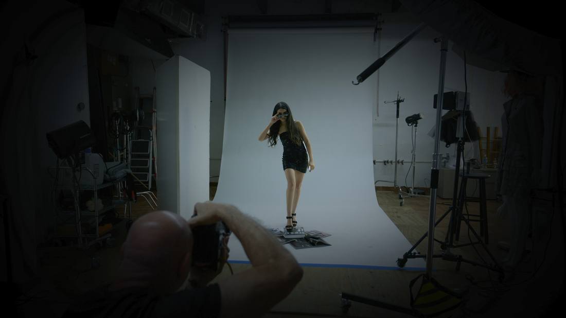 Directing a model on a studio cyclorama